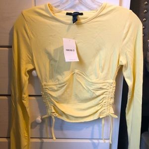 Yellow long sleeve crop top